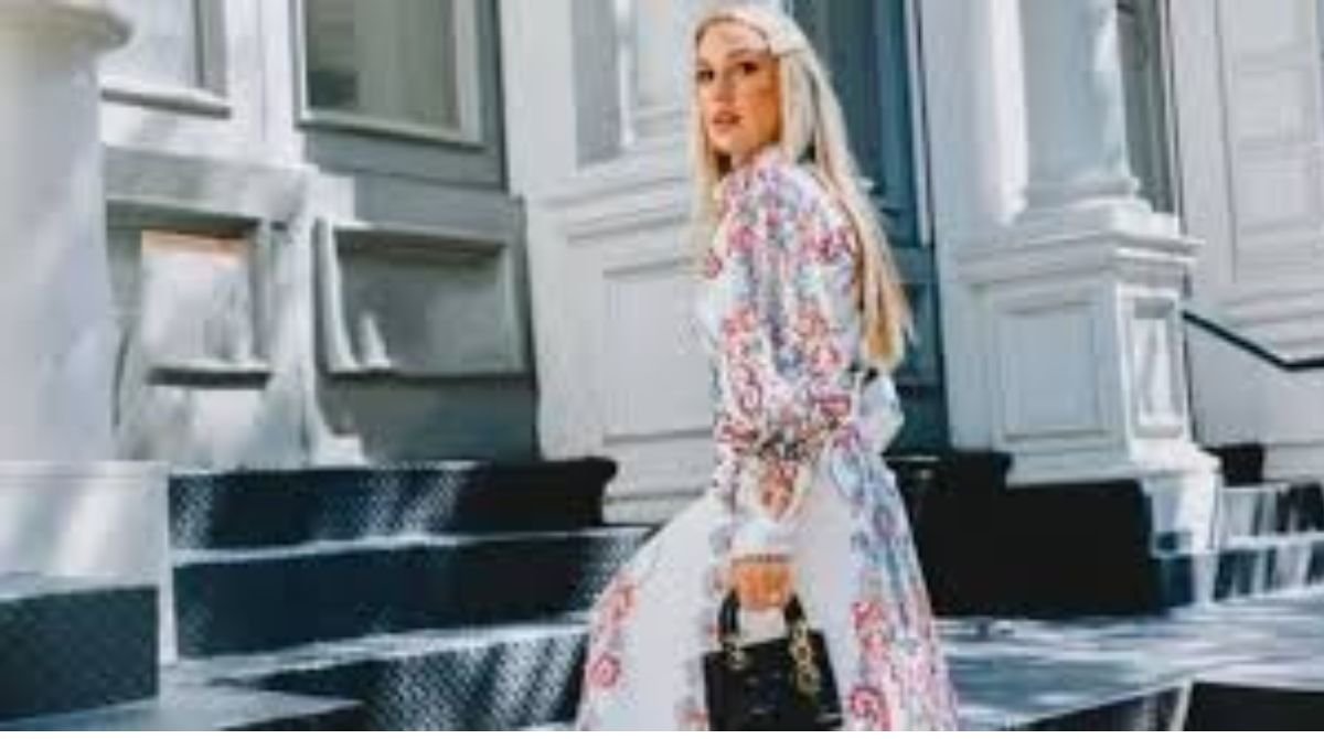Amanda Ivanelli wearing a floral long dress during a street style photoshoot, Amanda Ivanelli net worth and lifestyle fashion look
