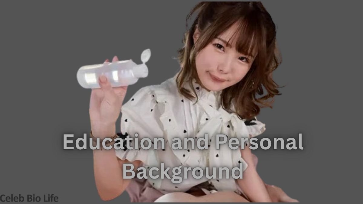 Woman holding bottle on gray background