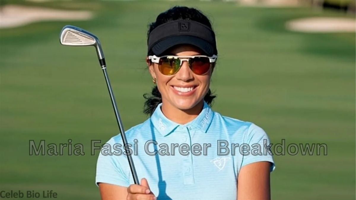 Smiling female golfer holding iron