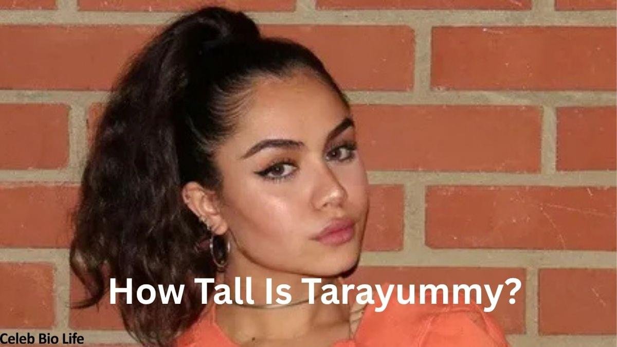 Tarayummy portrait against a brick wall